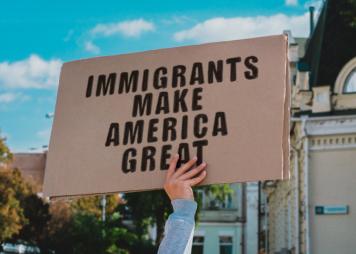 Immigrants make America great sign