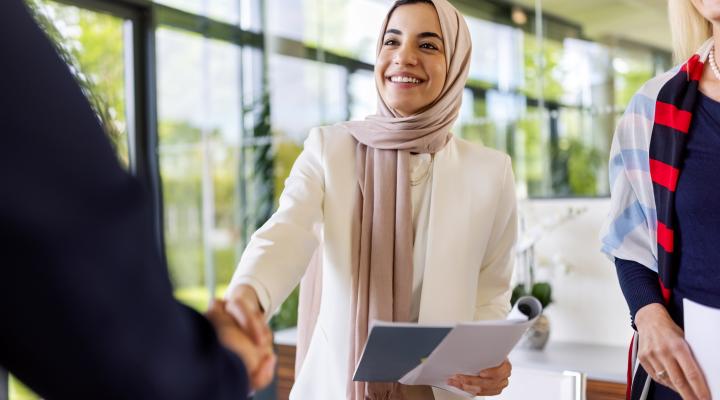 Business people sealing a deal with a handshake.